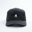 Black lightweight running cap with white logo – Grand Performance Running Cap